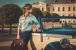 © Nejron Photo - Confident wealthy young man with briefcase near classic convertible