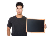 Young Man Show With Chalkboard