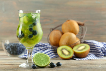 Canvas Print - Kiwi and Blueberry cocktail on wooden background