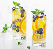 Healthy Water With Orange And Blueberries.