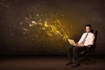 Sticker - Businessman with laptop and energy explosion on background