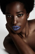beauty african woman with violet lips