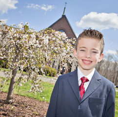 Boy outside church