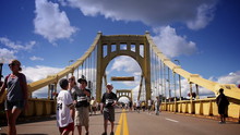 Pirates Fans Walk Across The Roberto Clemente Bridge