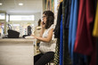 © FotoAndalucia - Pregnant woman working in clothes store
