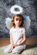 © moongerl - portrait of curly girl with angel wings