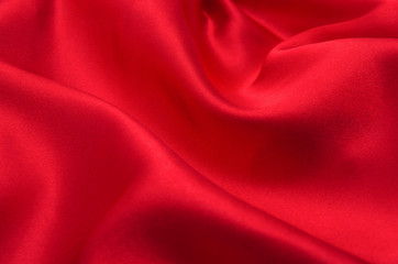 red satin or silk fabric as background