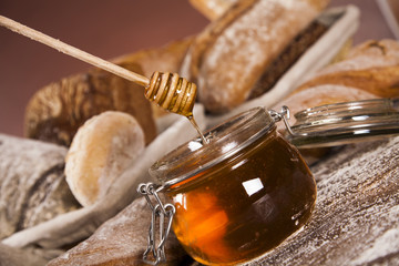 Wall Mural - Baked bread on wood table