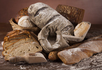 Wall Mural - Baked bread on wood table