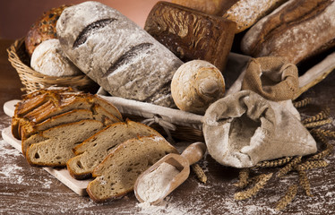 Wall Mural - Baked bread on wood table