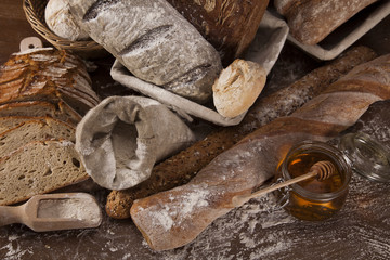 Wall Mural - Freshly baked bread on the wooden