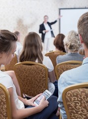 Wall Mural - Listener during dull presentation