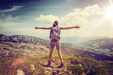 Poster - Hiker Standing with Open Arms Over Mountain Valley