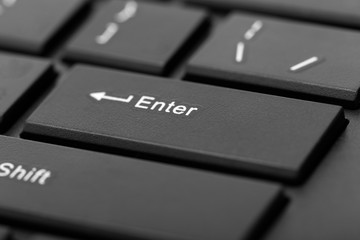 black computer keyboard close up, enter button