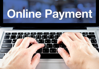 Poster - Online payment word on notebook screen with hand type on keyboar