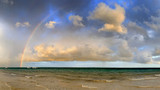 Fototapeta Tęcza - Boat and rainbow in ocean