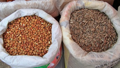 two sacks with seeds on the market in Lijiang