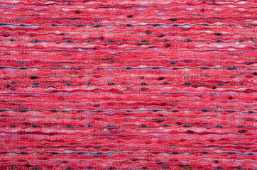 Wall Mural - Close up on knit texture fabric. Pink and blue horizontal woven thread as a background.