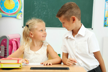 Wall Mural - Portrait of happy pupils at lesson