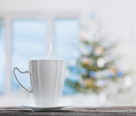 Sticker - white cup on background Christmas fir and window