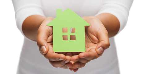 woman hands holding green house