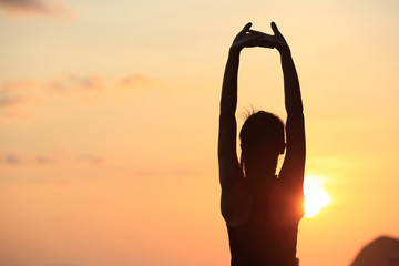 Poster - healthy fitness yoga woman  stretching at sunrise seaside