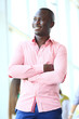 © opolja - Portrait of smiling African American business man with executive