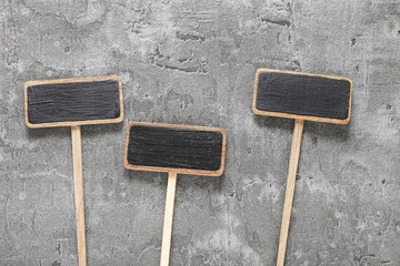 Blank chalkboard on gray stone background