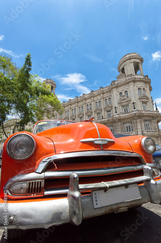 Naklejka - mata magnetyczna na lodówkę Orange car in Havana, Cuba