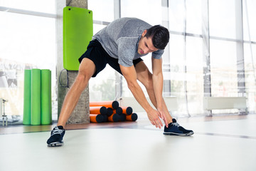 Sticker - Fitness man warming-up at gym