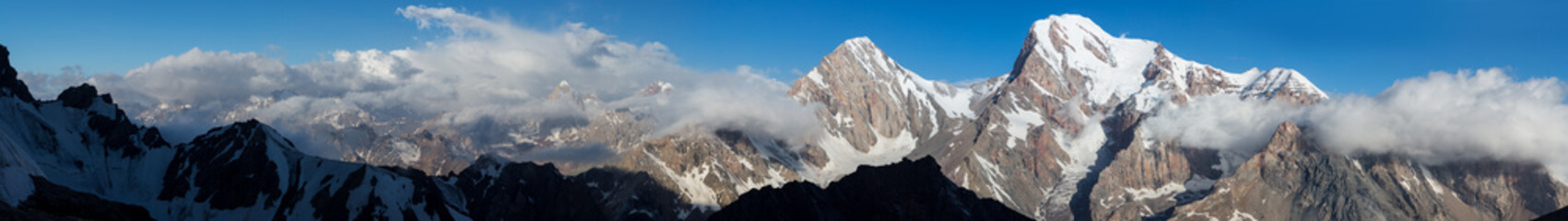 Wall Mural - Wide Sunny Mountain Panorama of Fan Valley in Tajikistan Mountain View Landscape with Multiple Peaks and Rocky Cliffs Glaciers and Snow Places Famous Location Attraction