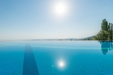 Poster - Infinity pool on the bright summer day