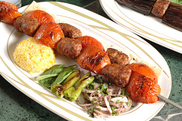 plate of  Kebab with tomato a typical turkish meat dish