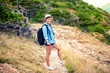 © aboutmomentsimages - Hiker with backpack on mountains, trekking and enjoying natural, fresh air