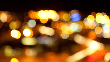 Wall Mural - golden bright lights on dark night background