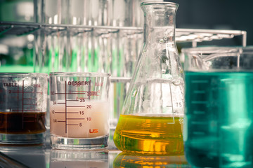 Wall Mural - laboratory glassware containing chemical liquid