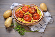 Potatoes and tomatoes stuffed with rice