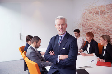 Wall Mural - senior business man with his team at office