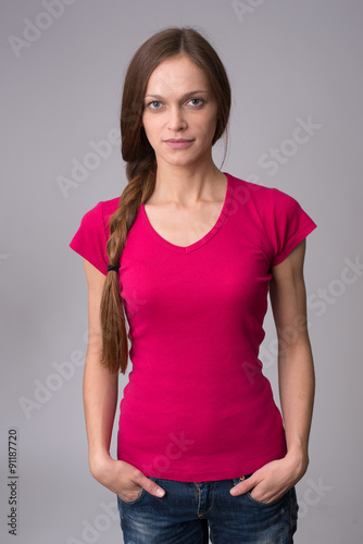 Fotografia, Obraz beautiful girl with pigtails on gray background