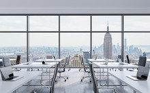 Workplaces In A Modern Panoramic Office, New York City View From The Windows. Open Space. White Tables And Black Leather Chairs. A Concept Of Financial Consulting Services. 3D Rendering.