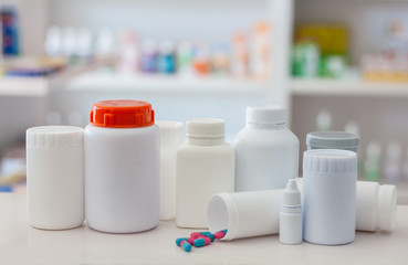 Composition of medicine bottles and pills with pharmacy store sh