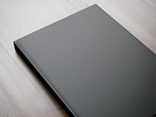 Wall Mural - Mockup of blank book on the table. 3d rendering