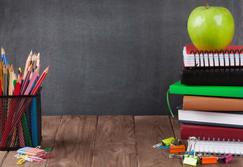 School and office supplies on classroom table