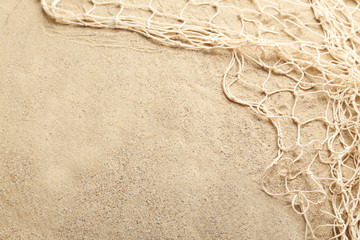 Fishing net on a beach sand