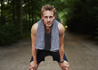 © Flamingo Images - Man with Towel on his Neck Resting After Exercise