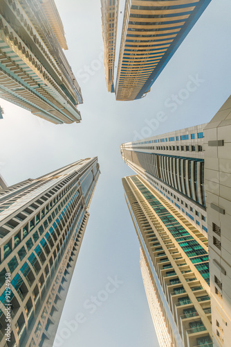 Fototapeta na wymiar Tall Dubai Marina skyscrapers in UAE