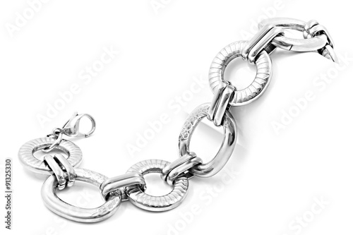 Fotografía Stainless steel bracelet on a white background