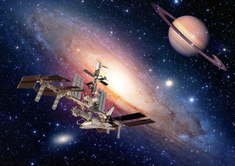 Wall Mural - satellite space station spaceship spacecraft outer planet saturn. elements of this image furnished b