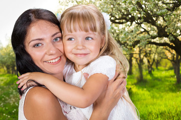 Happy mother and child girl