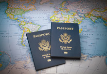 Travel Passports On A World Map Ready For Any Exotic Destination